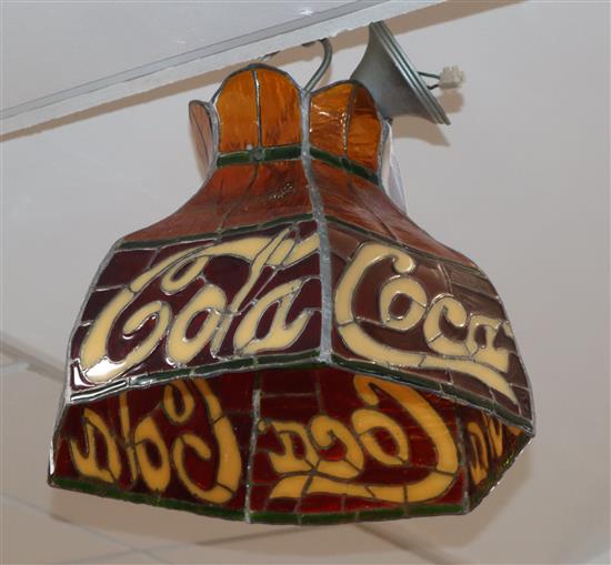 A vintage Coca Cola advertising stained glass ceiling shade